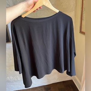 Veronica M. Womens black blouse. Loose fitting. Size fit range from small-large.